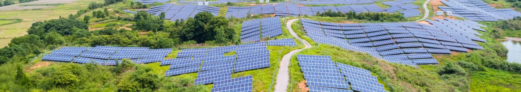 solar power plant on hillside, aerial view of clean energy in mountainous area solar power plant on hillside, aerial view of clean energy in mountainous area